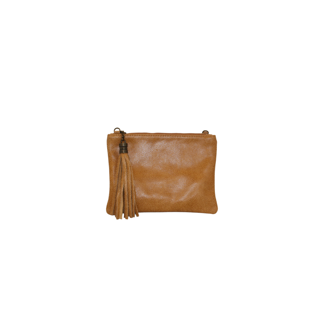 small tan leather clutch with tassel